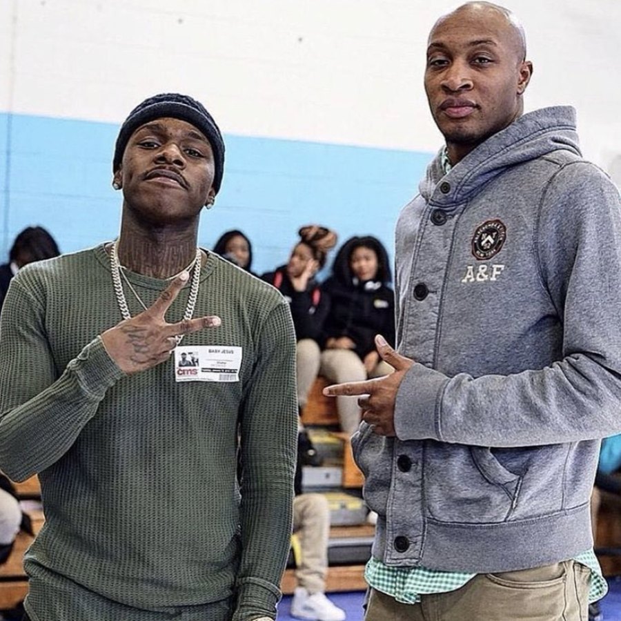 Albert M. Carter with an artist at a Charlotte school event